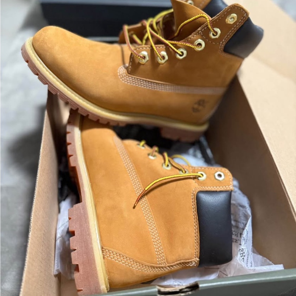 Timberland Tan and Black women’s boots